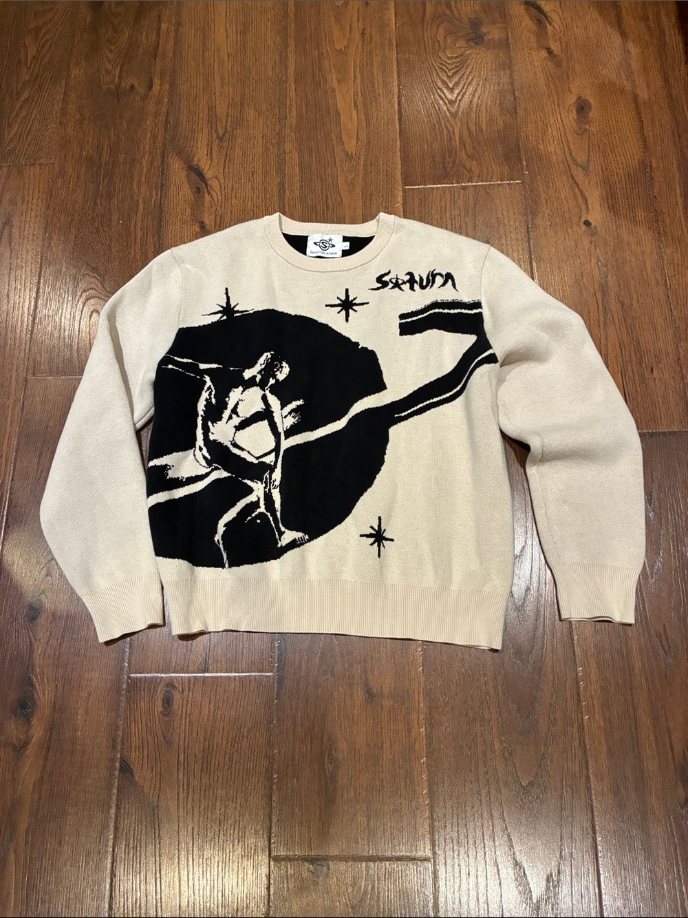 Unbranded Cream Crewneck Sweater with Black Graphic Design